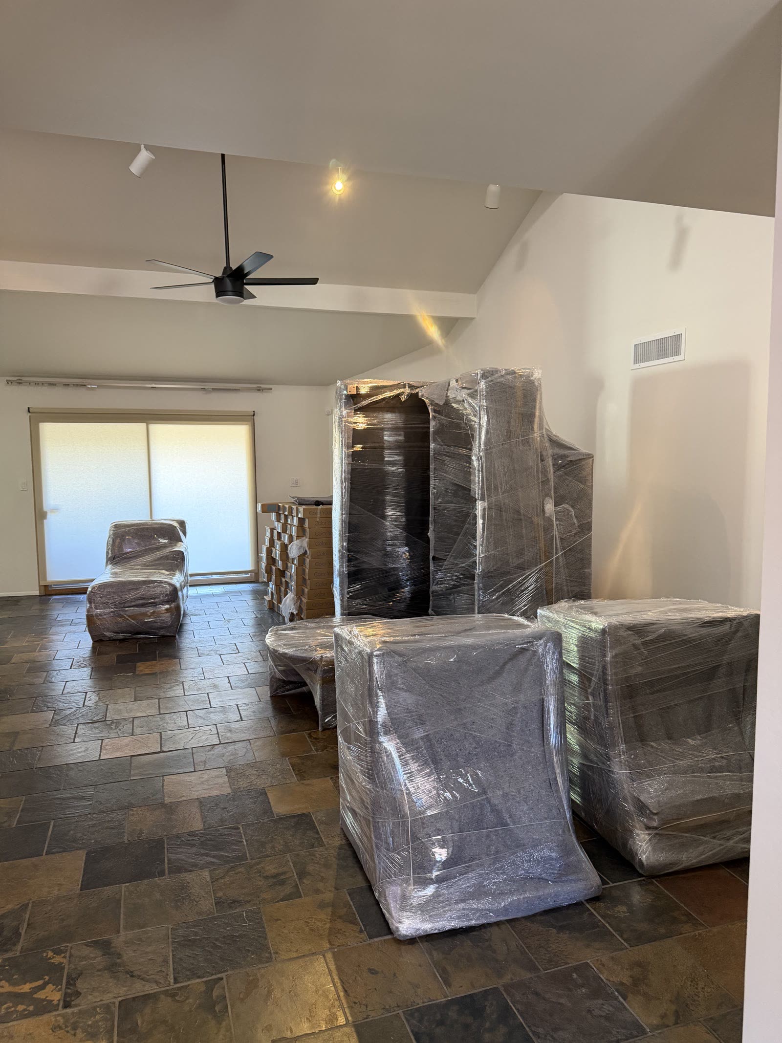 Furniture wrapped and padded for packing and storage by Marathon Movers, Phoenix AZ